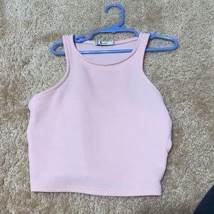 cute pink tank top with cut outs in the back/side
